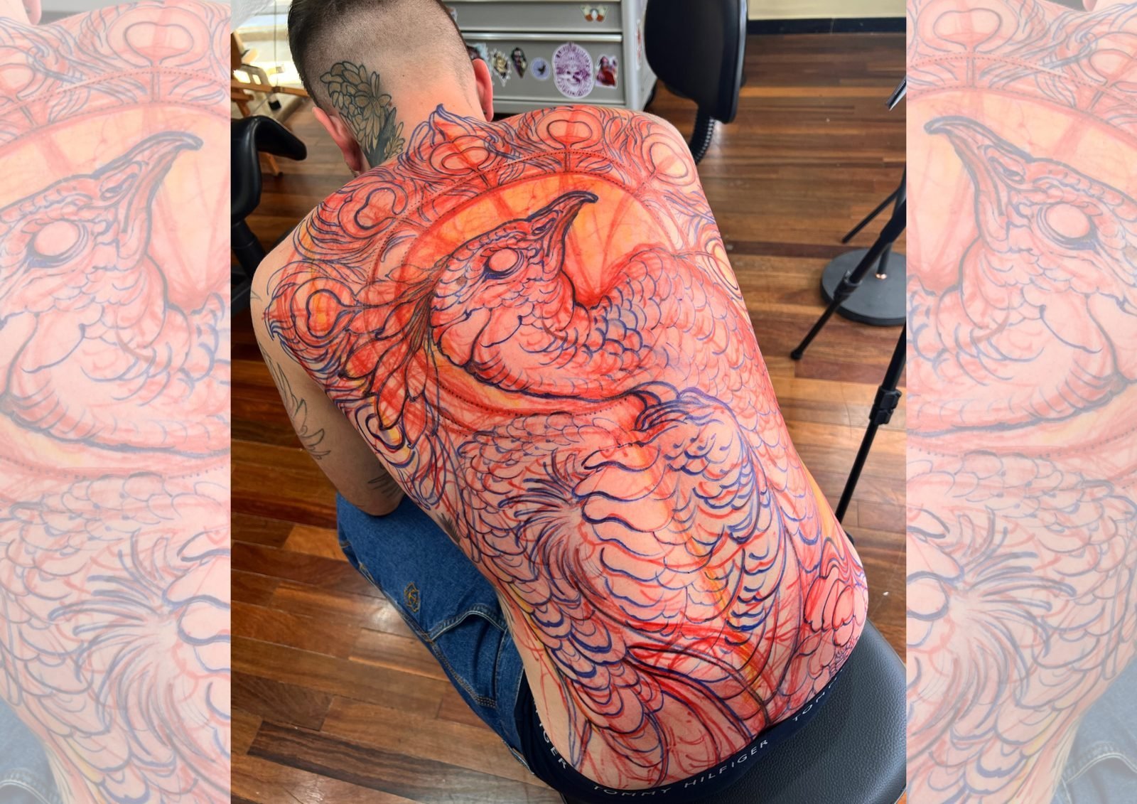 Freehand de fênix desenhado nas costas, à mão livre
